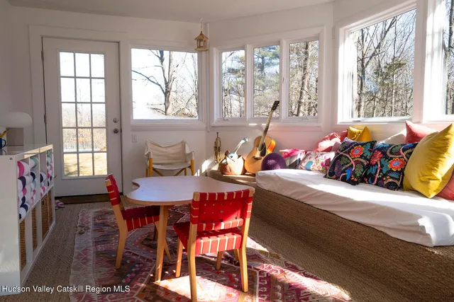 a living room with furniture and a table