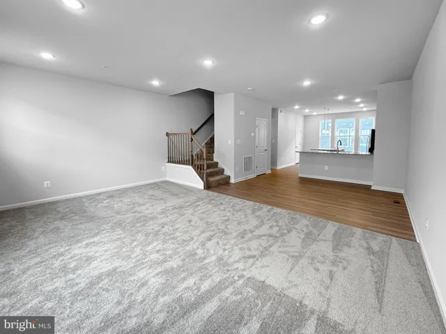 a view of a livingroom with a staircase