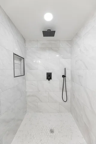 a view of a hallway with windows