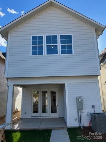 a house view with a backyard space