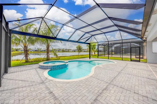 a view of a house with swimming pool
