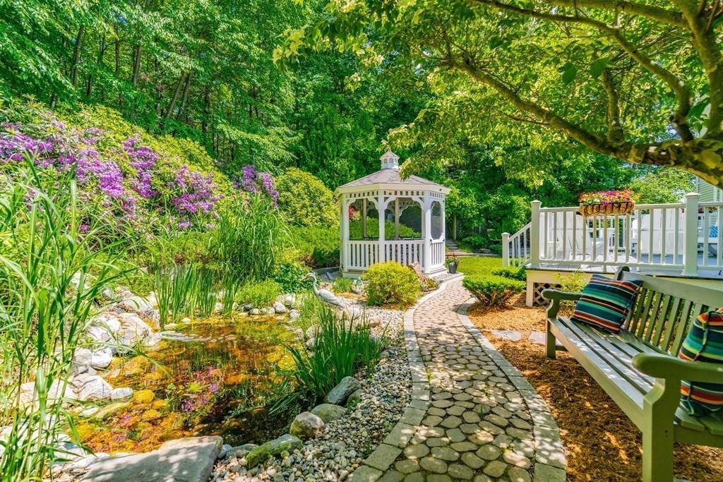 48 Scenic Road Westfield, MA 01085 - Photo 7 of 42 a view of a chair and table in the garden