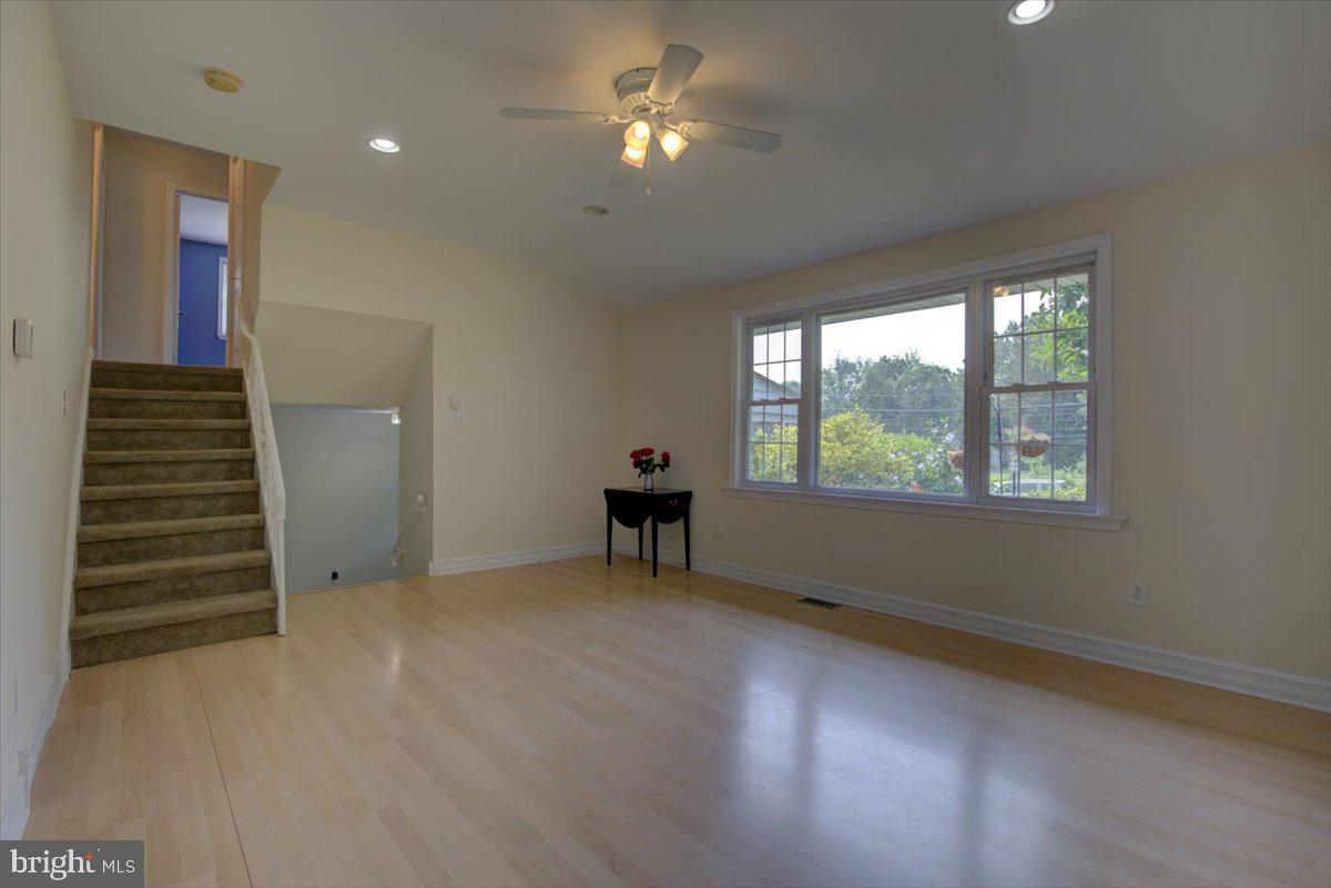 124 Conestoga Road Malvern, PA 19355 - Photo 12 of 34 Stairs to second level are off the living room