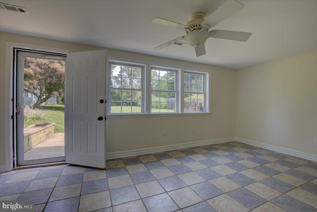 124 Conestoga Road Malvern, PA 19355 - Photo 16 of 34 Family room with a trio of windows