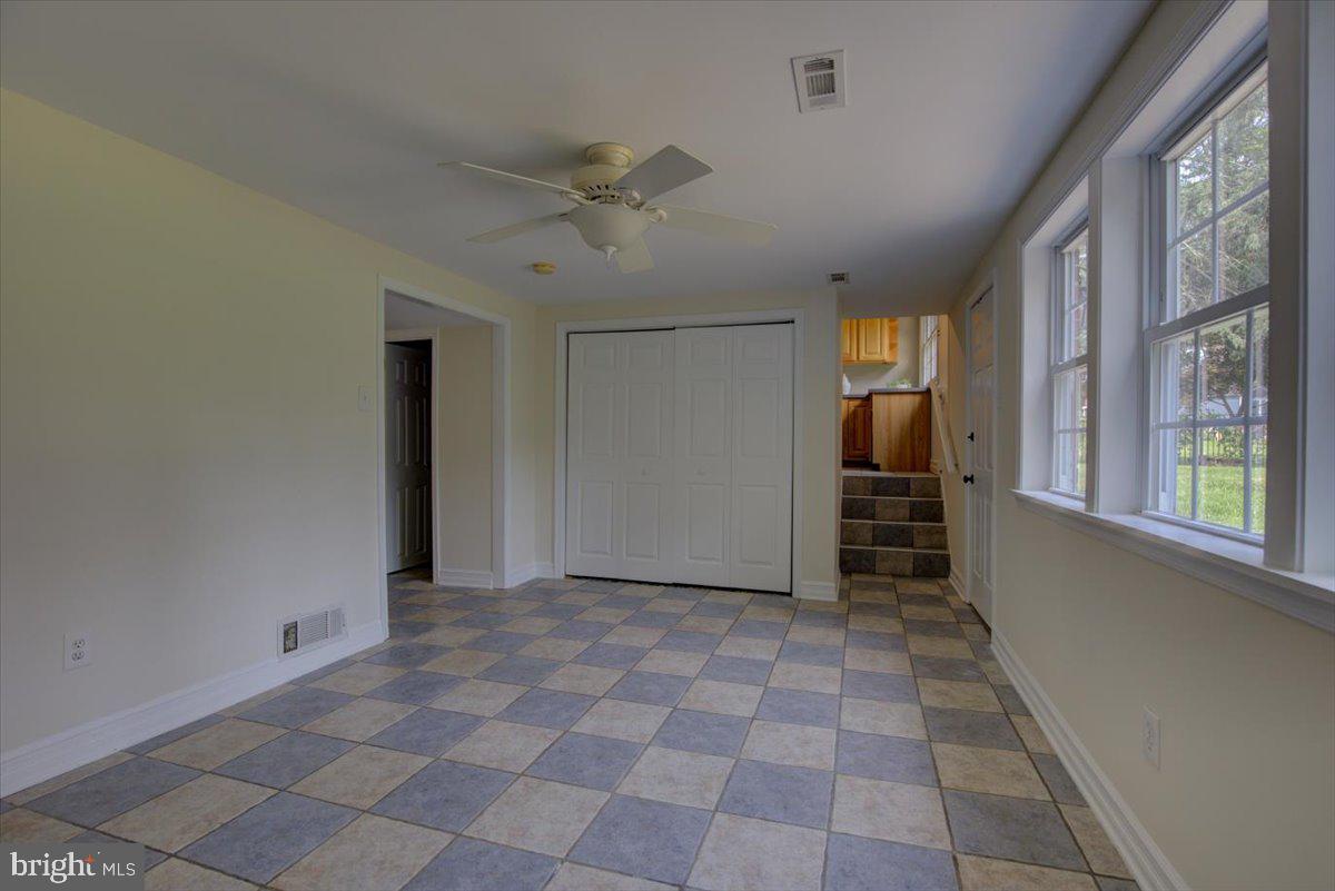 124 Conestoga Road Malvern, PA 19355 - Photo 17 of 34 Family room with rear staircase to kitchen