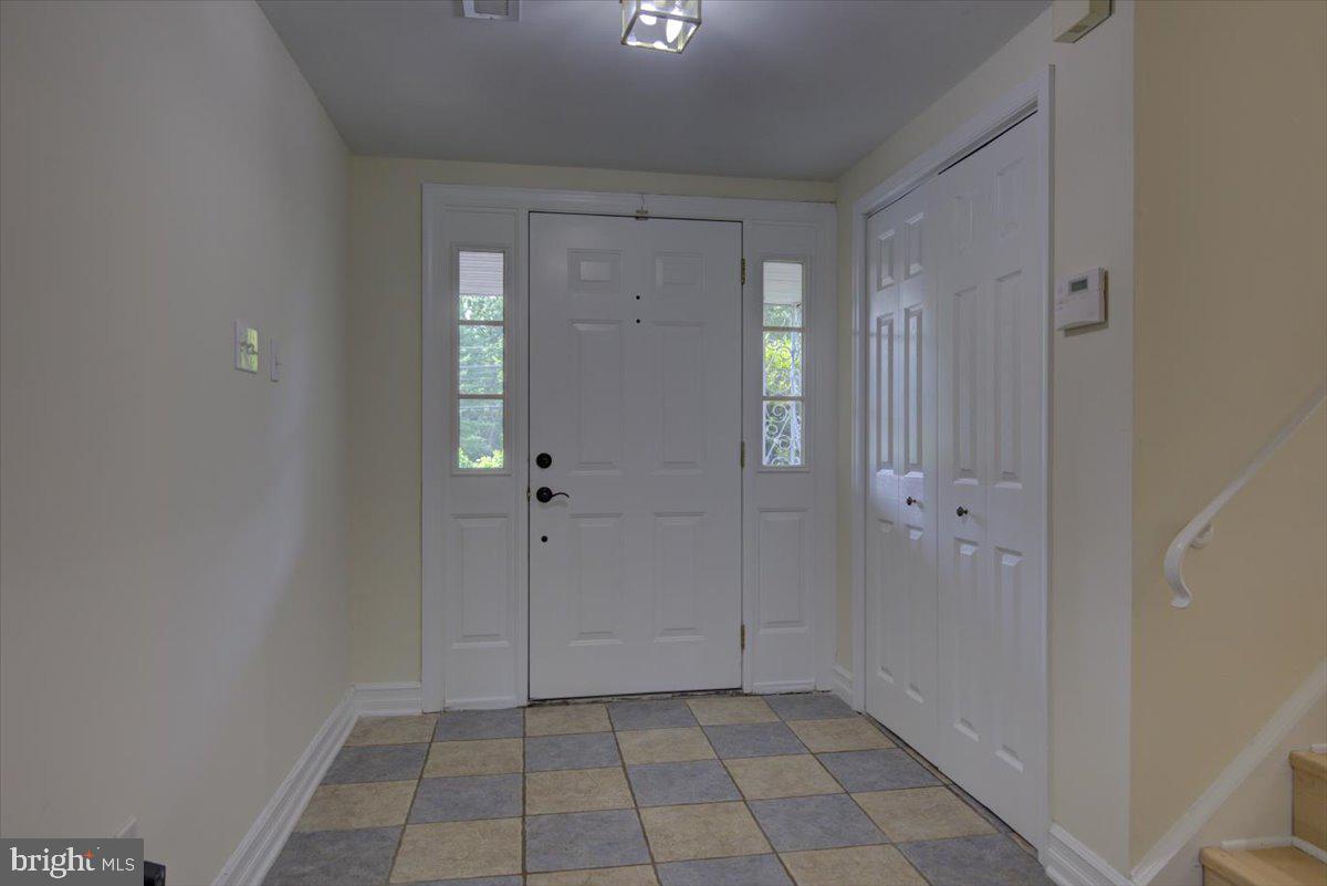124 Conestoga Road Malvern, PA 19355 - Photo 5 of 34 Foyer with double coat closet
