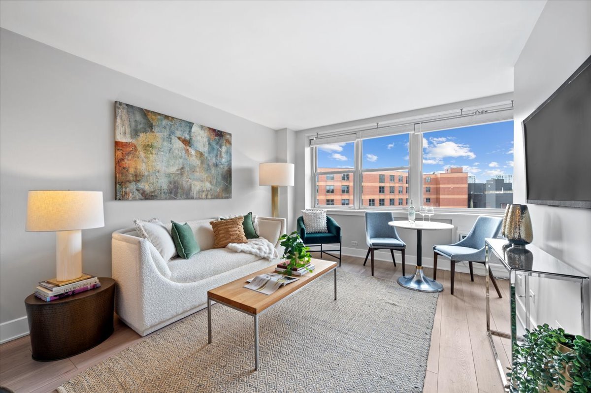 2300 North Commonwealth Avenue, Unit 7J Chicago, IL 60614 - Photo 4 of 20 a living room with furniture and a large window