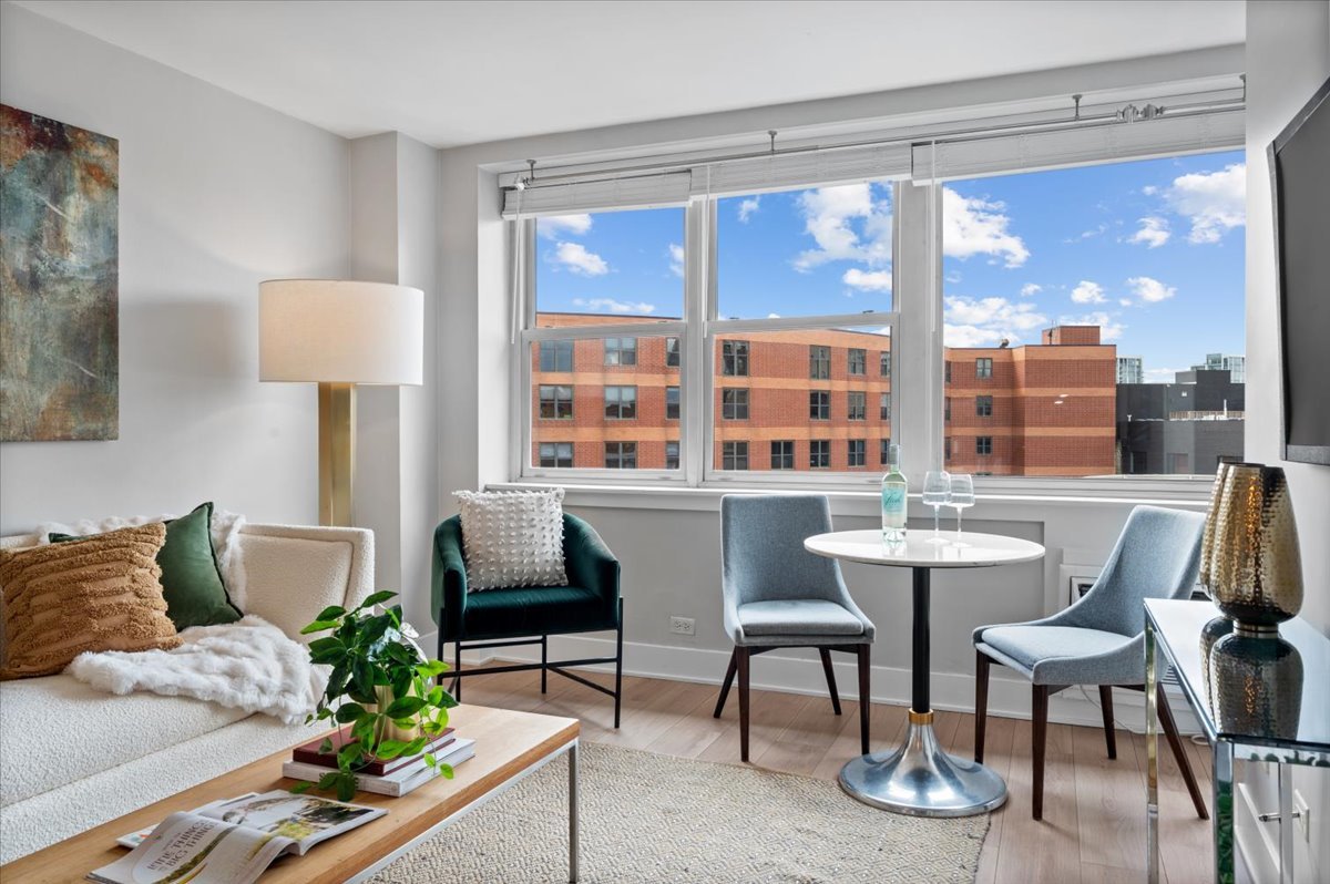 2300 North Commonwealth Avenue, Unit 7J Chicago, IL 60614 - Photo 5 of 20 a living room with furniture and a large window