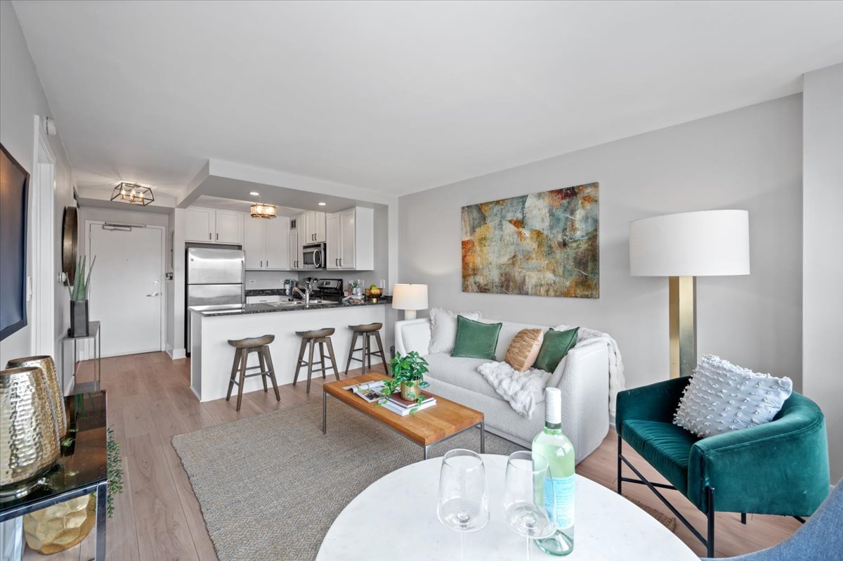 2300 North Commonwealth Avenue, Unit 7J Chicago, IL 60614 - Photo 8 of 20 a living room with furniture and a table