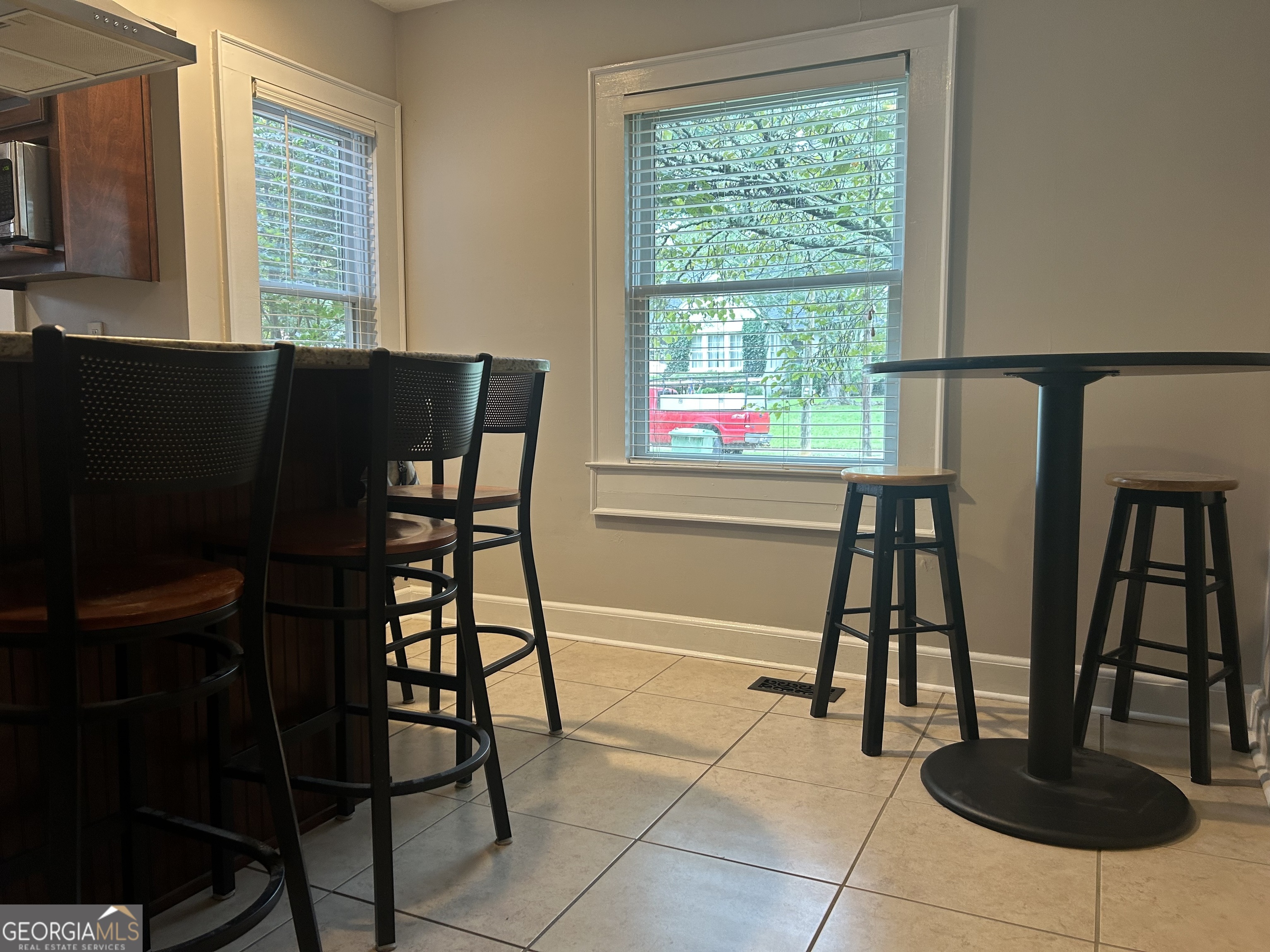 18 Terracedale Court Griffin, GA 30224 - Photo 6 of 27 a view of a dining room with furniture and a window
