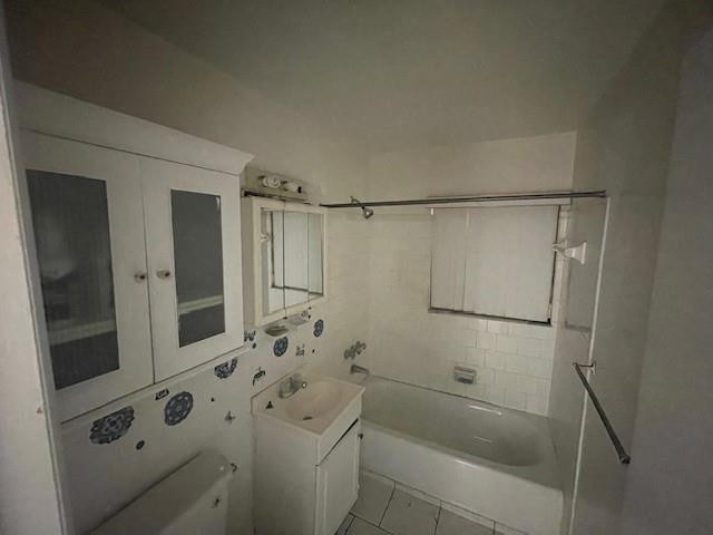 1104 West 24th Street Riviera Beach, FL 33404 - Photo 15 of 18 a bathroom with a bathtub and a shower