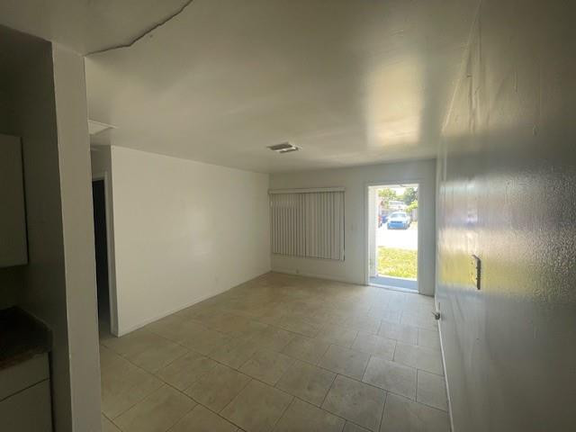 1104 West 24th Street Riviera Beach, FL 33404 - Photo 16 of 18 a view of an empty room and window