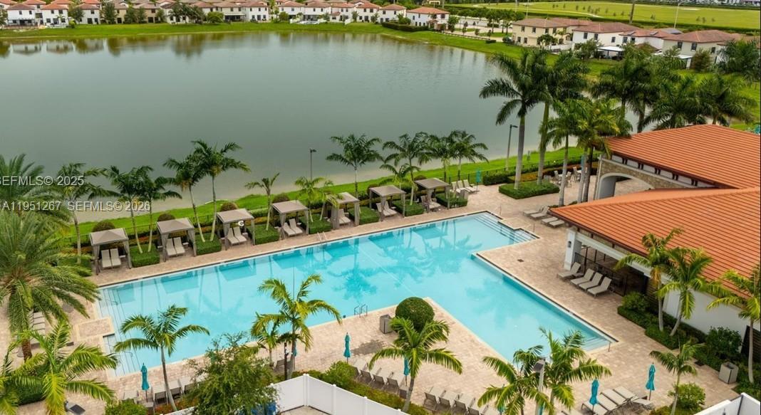 10306 West 33rd Lane Hialeah, FL 33018 - Photo 20 of 29 a view of a house with a lake