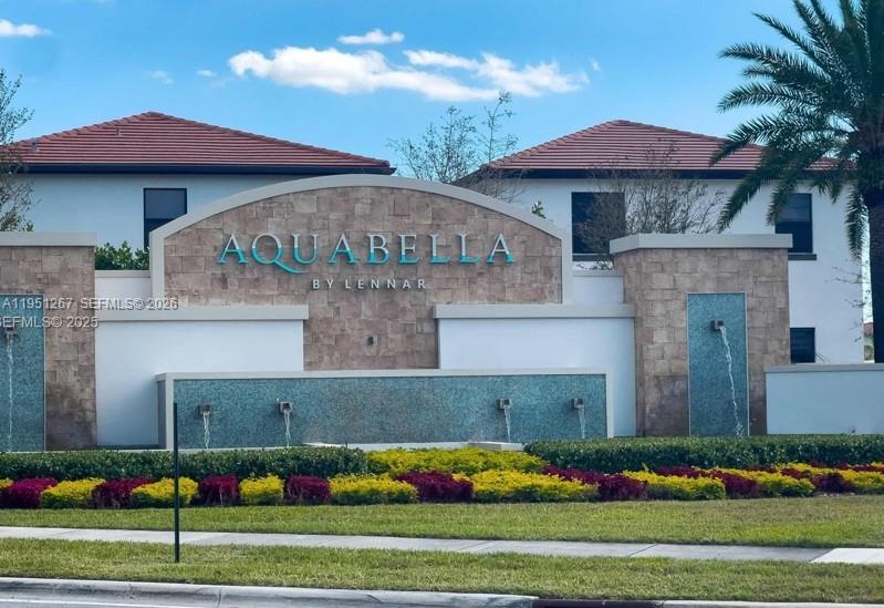 10306 West 33rd Lane Hialeah, FL 33018 - Photo 27 of 29 a front view of a house with garden