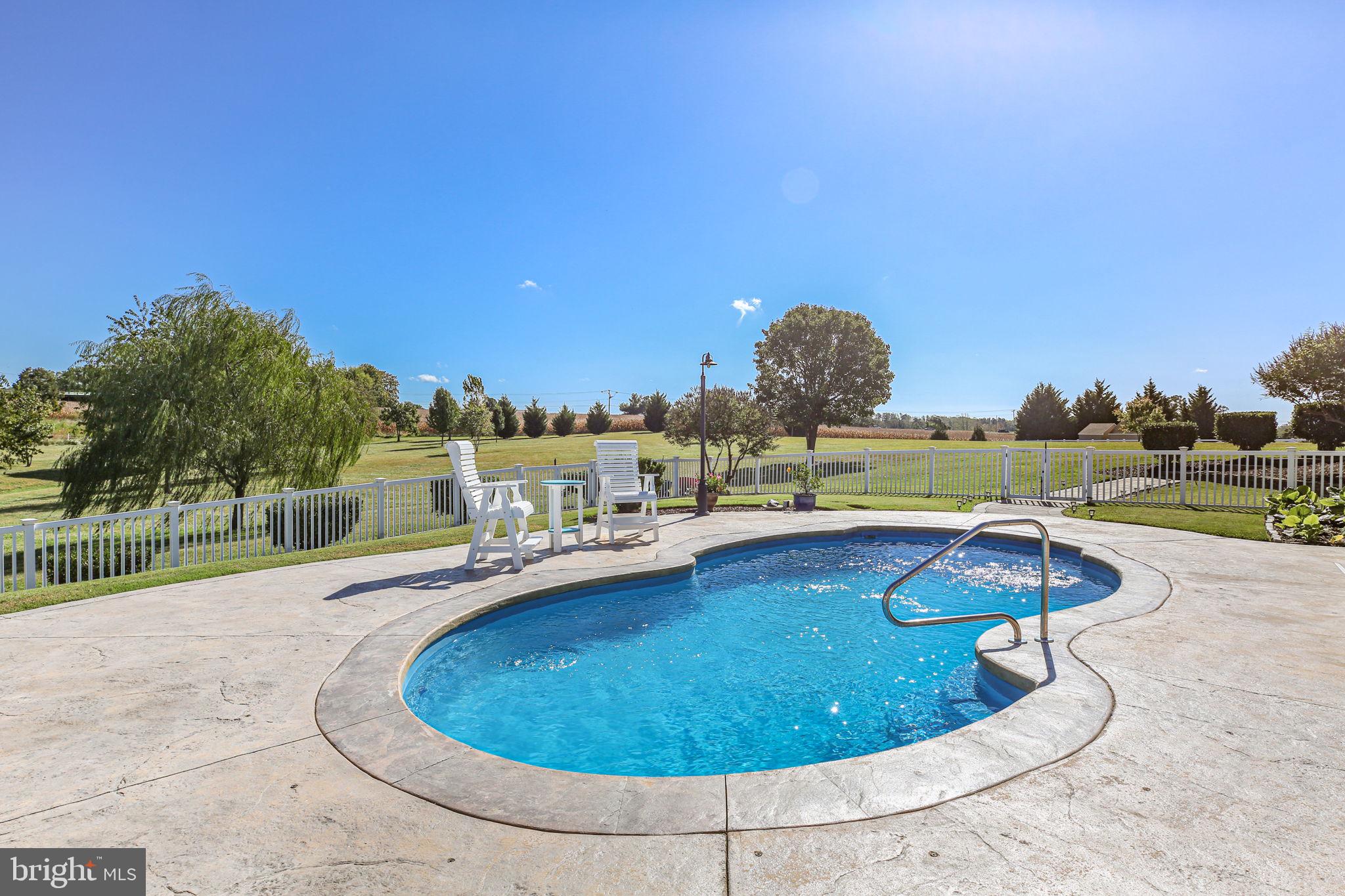 9910 Agnes Lane Spotsylvania, VA 22553 - Photo 106 of 106 a view of a swimming pool with a patio
