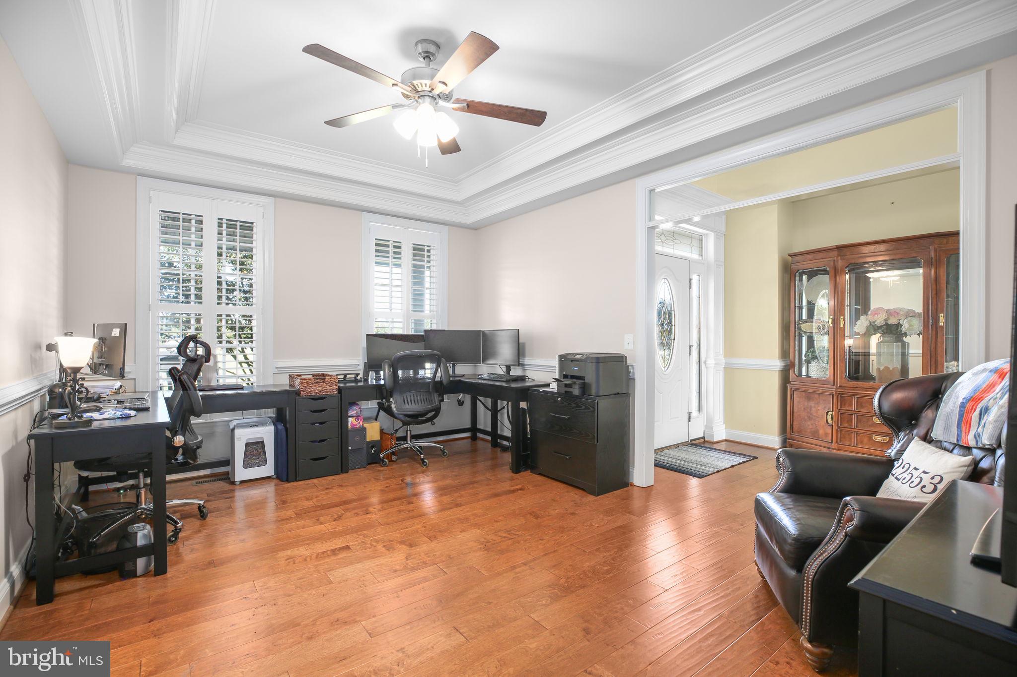 9910 Agnes Lane Spotsylvania, VA 22553 - Photo 13 of 106 a view of a livingroom with workspace and a window