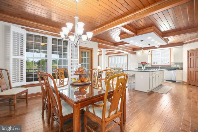 a front view of a house with a garden and yard