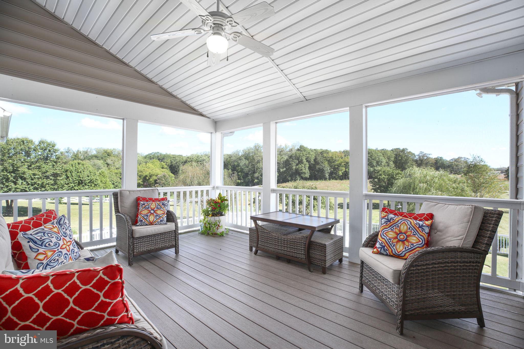 9910 Agnes Lane Spotsylvania, VA 22553 - Photo 27 of 106 a balcony with furniture and a large window