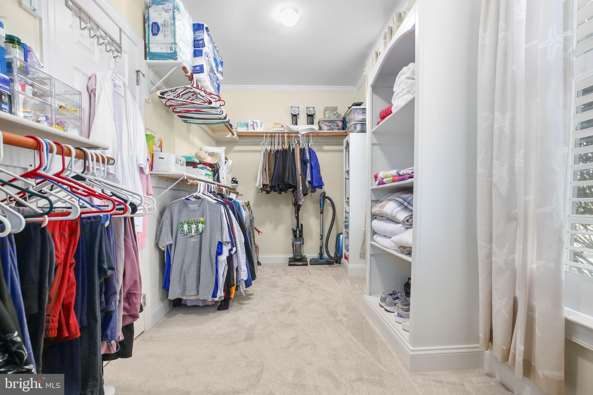 9910 Agnes Lane Spotsylvania, VA 22553 - Photo 35 of 106 a view of walk in closet with clothes