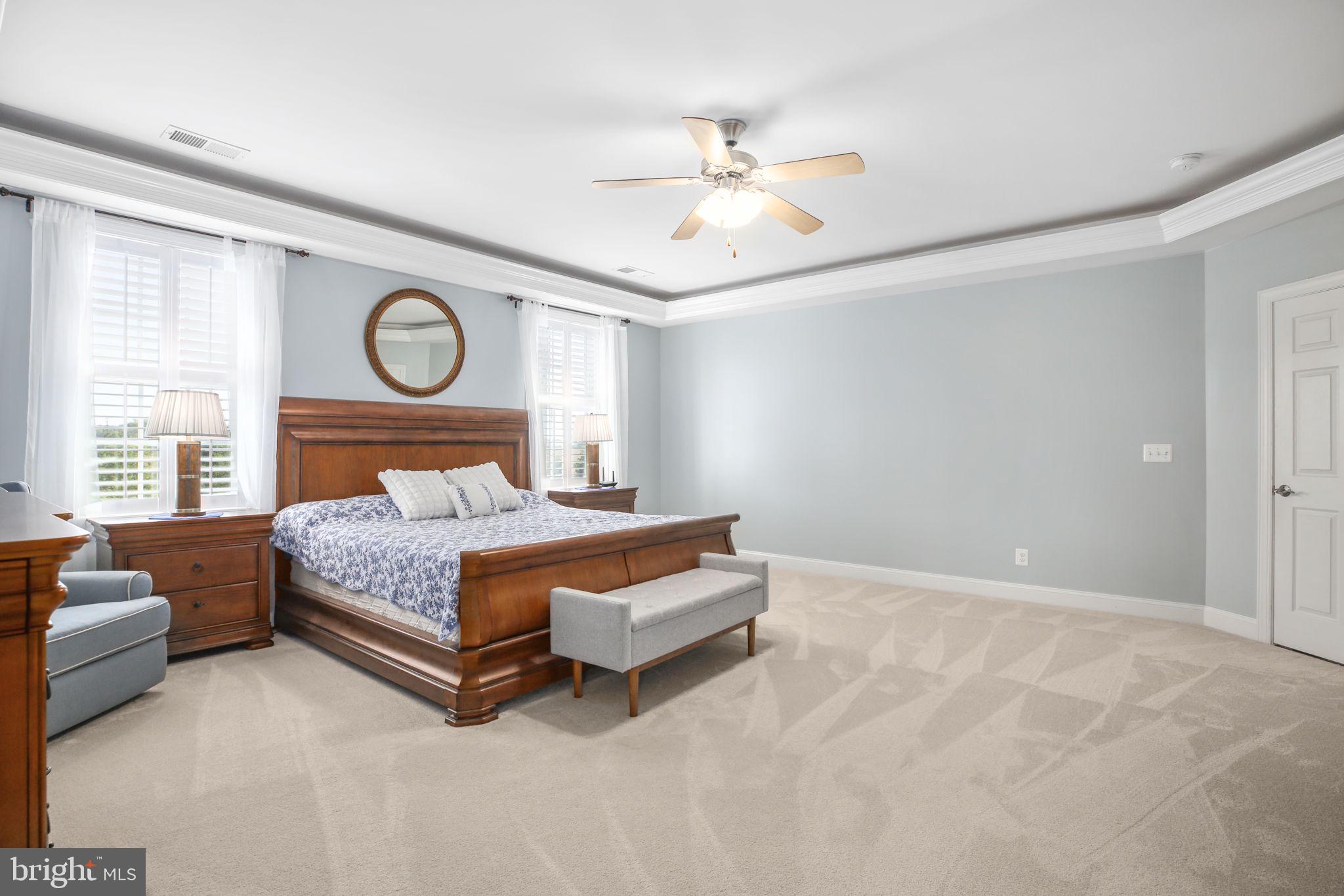 9910 Agnes Lane Spotsylvania, VA 22553 - Photo 40 of 106 a bedroom with a bed and ceiling fan
