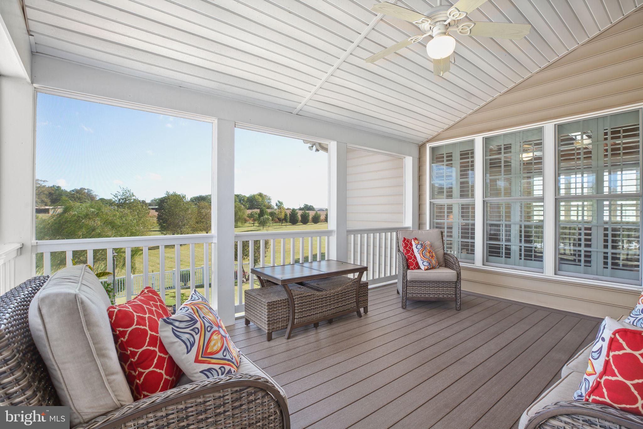 9910 Agnes Lane Spotsylvania, VA 22553 - Photo 6 of 106 a living room with furniture and a floor to ceiling window