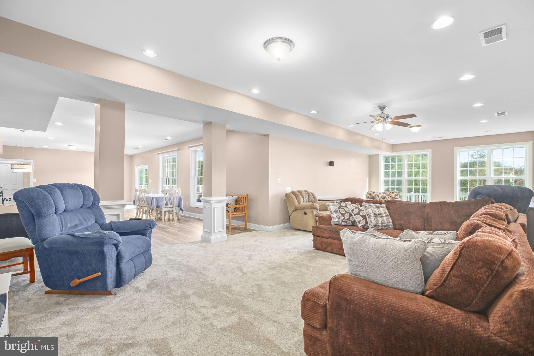 9910 Agnes Lane Spotsylvania, VA 22553 - Photo 64 of 106 a living room with furniture and a large window