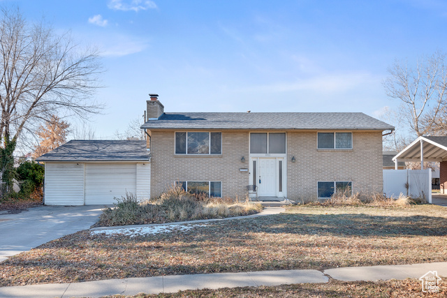 8300 South 745 East Sandy, UT 84094 - Photo 1 of 1 Split foyer home with a garage