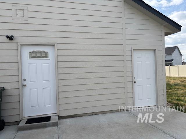 4215 North Pindus Avenue Meridian, ID 83646 - Photo 41 of 46 Garage man door and storage shed door
