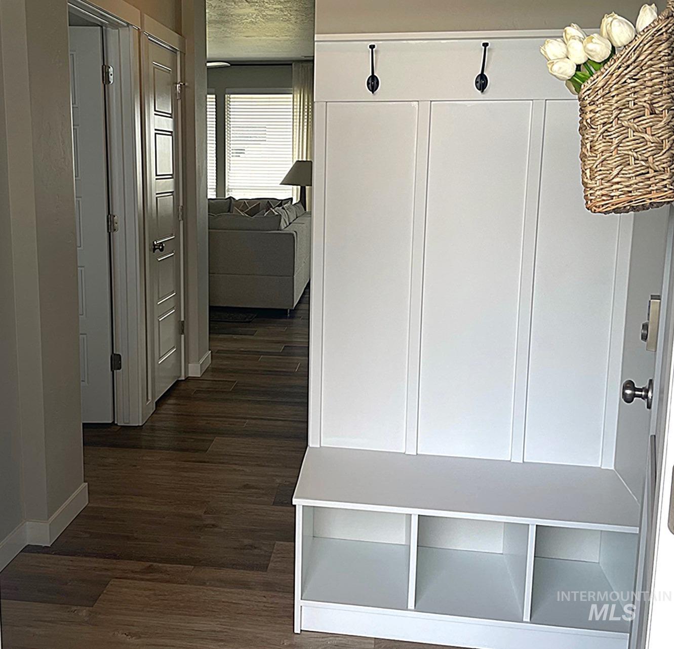 4215 North Pindus Avenue Meridian, ID 83646 - Photo 5 of 46 Front entry with LVP, white hall tree with bench