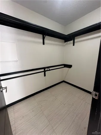 a view of a room with an empty space