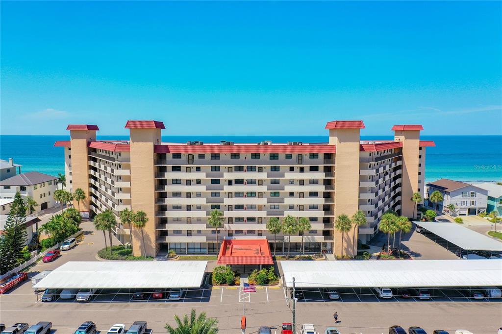 18304 Gulf Boulevard, Unit 514 Redington Shores, FL 33708 - Photo 1 of 1 a view of building with outdoor space
