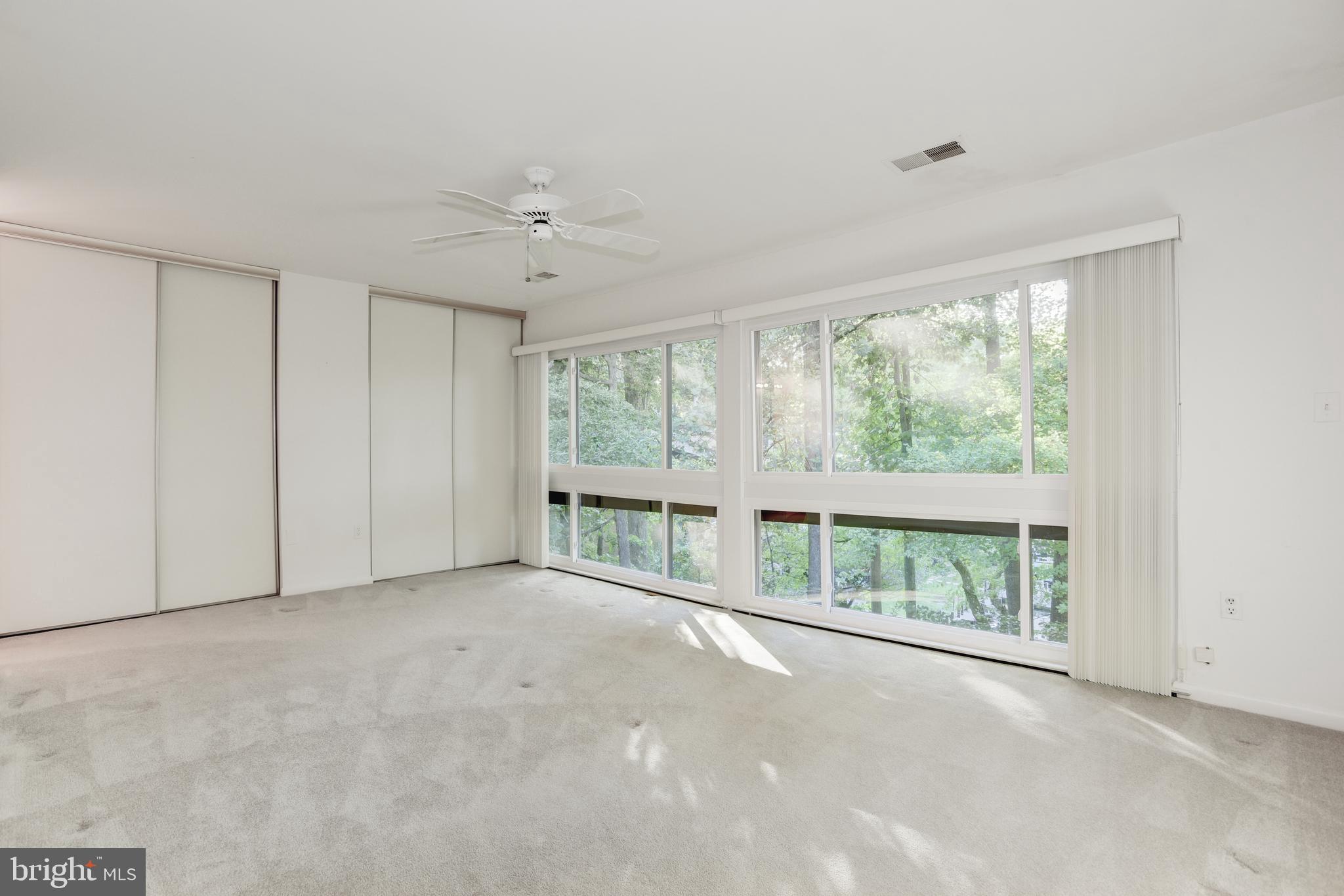 2025 Lakebreeze Way Reston, VA 20191 - Photo 18 of 48 a view of an empty room with a window