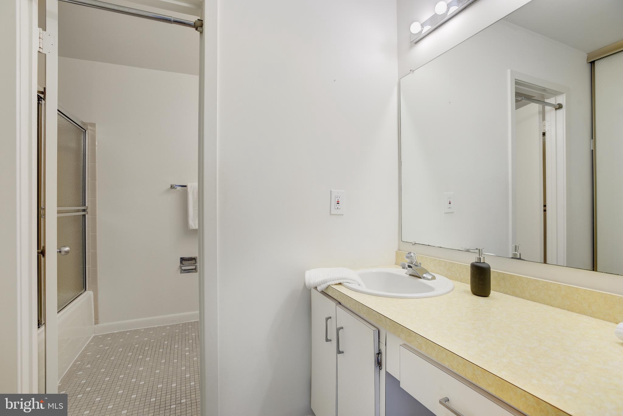 2025 Lakebreeze Way Reston, VA 20191 - Photo 21 of 48 a bathroom with a sink and a mirror