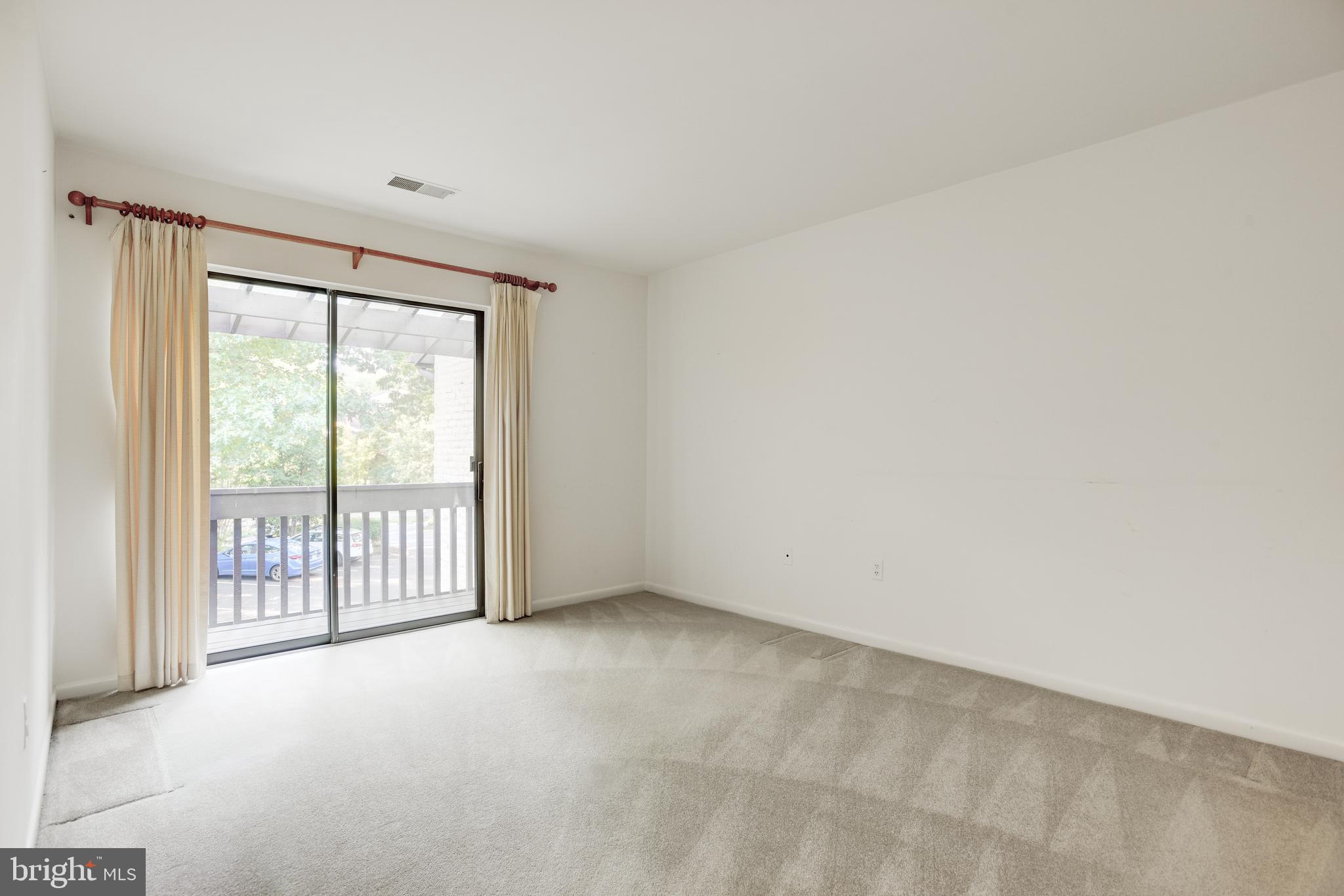 2025 Lakebreeze Way Reston, VA 20191 - Photo 24 of 48 a view of an empty room with a window