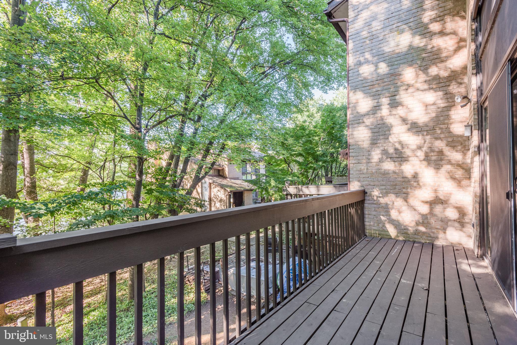 2025 Lakebreeze Way Reston, VA 20191 - Photo 38 of 48 a view of balcony with wooden floor