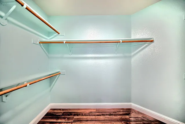 a view of a room with racks on the wall