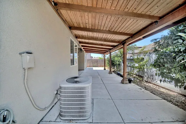 a view of a house with large windows
