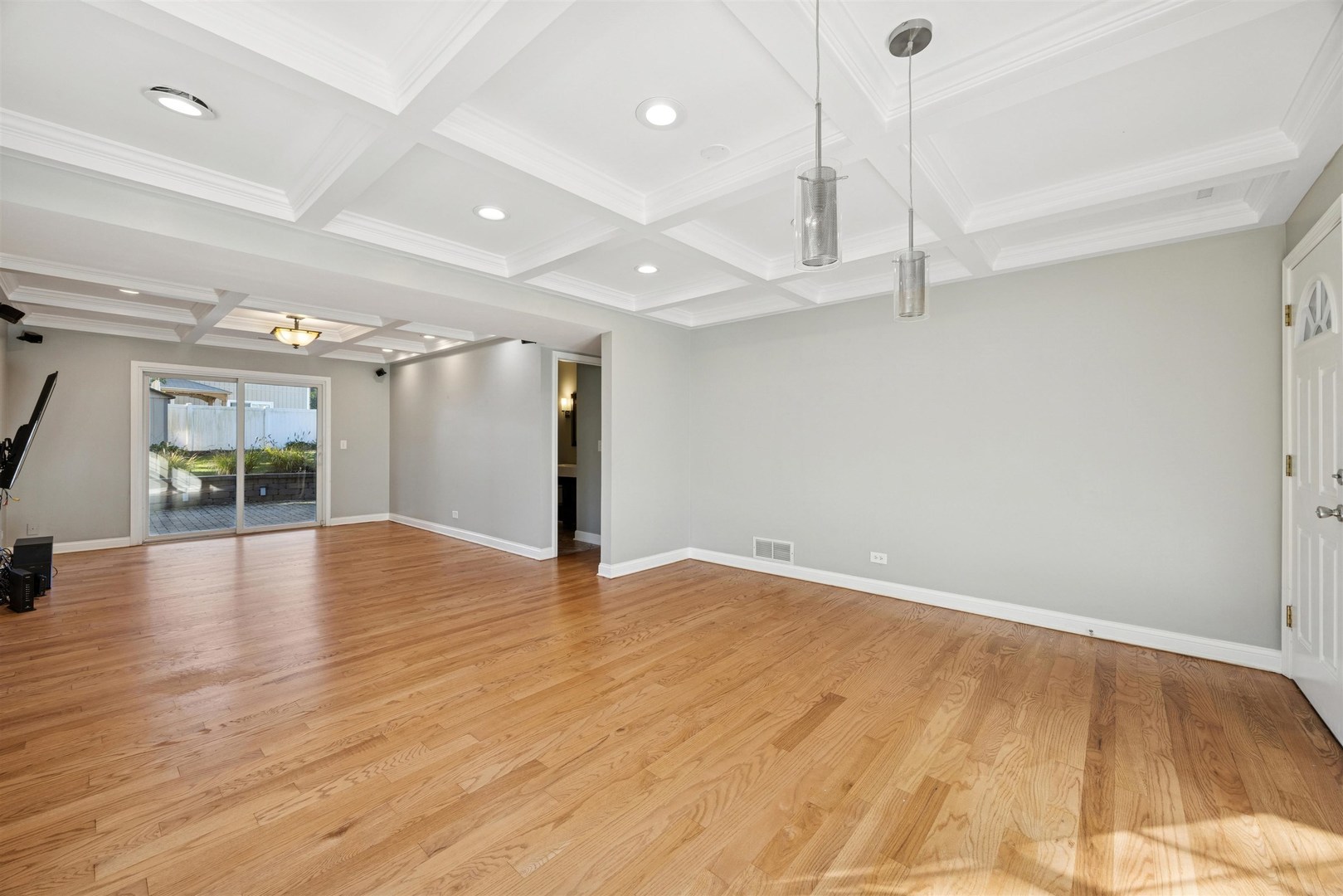 1116 Hidden Spring Drive Naperville, IL 60540 - Photo 11 of 32 a view of an empty room with wooden floor