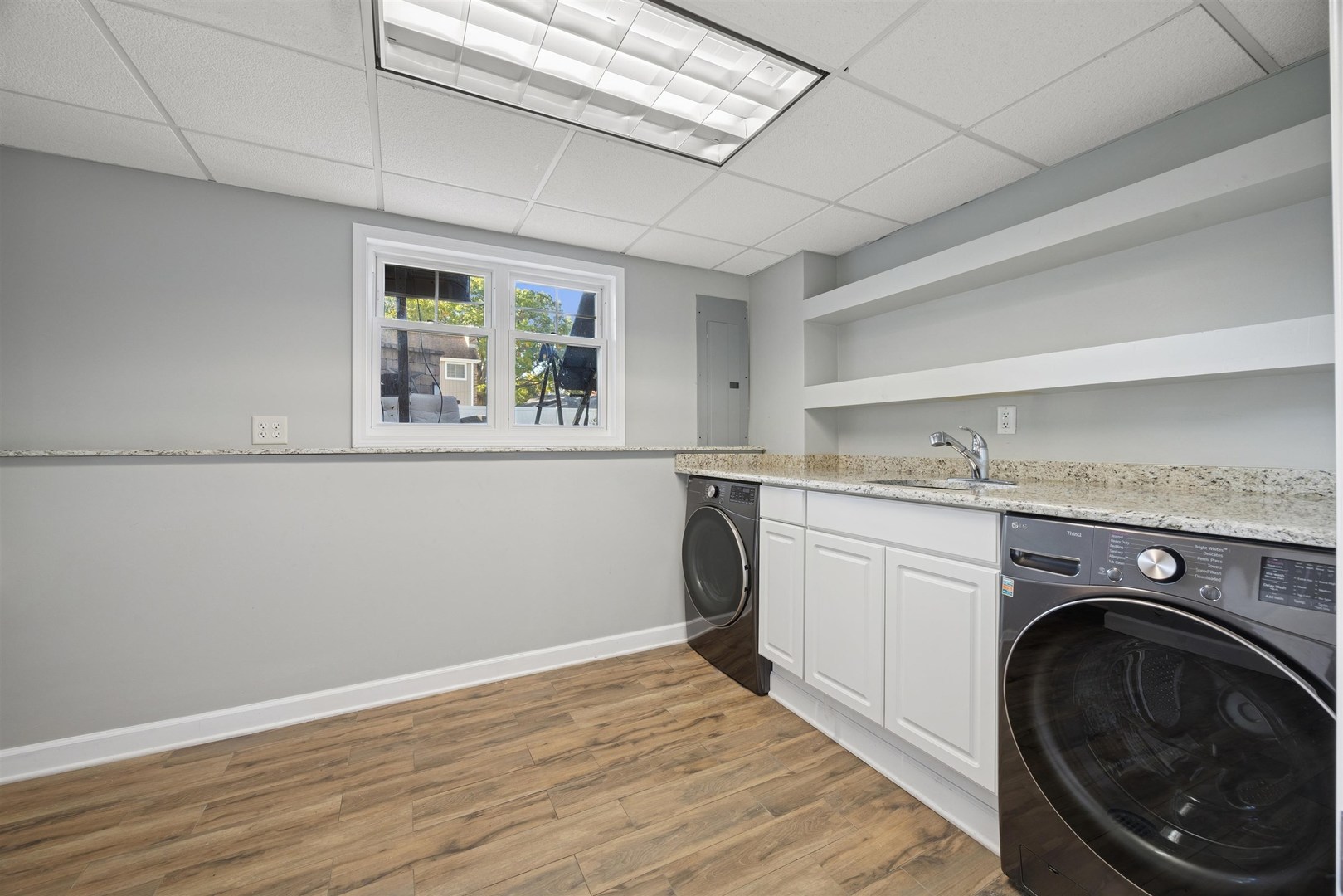 1116 Hidden Spring Drive Naperville, IL 60540 - Photo 13 of 32 a view of a kitchen with sink washer and dryer