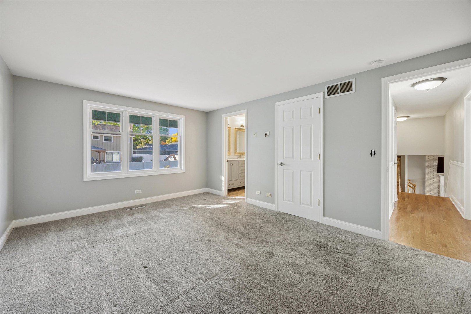 1116 Hidden Spring Drive Naperville, IL 60540 - Photo 15 of 32 an empty room with windows and closet