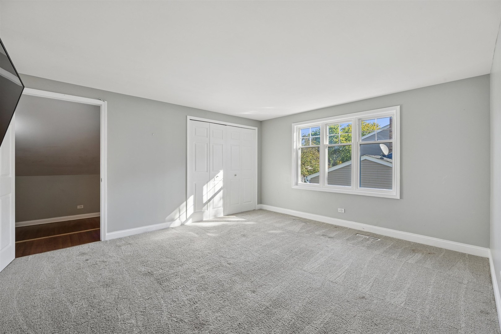 1116 Hidden Spring Drive Naperville, IL 60540 - Photo 17 of 32 a view of an empty room with a window