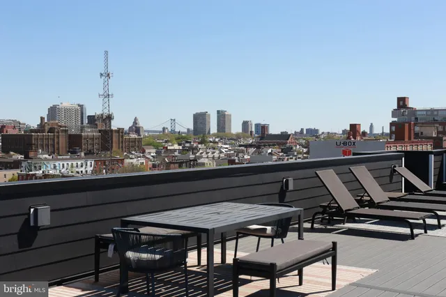 a view of a terrace with sitting area