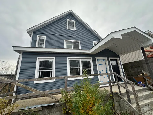a house view with a outdoor space