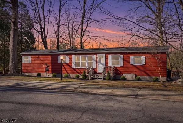 front view of a house with a big yard
