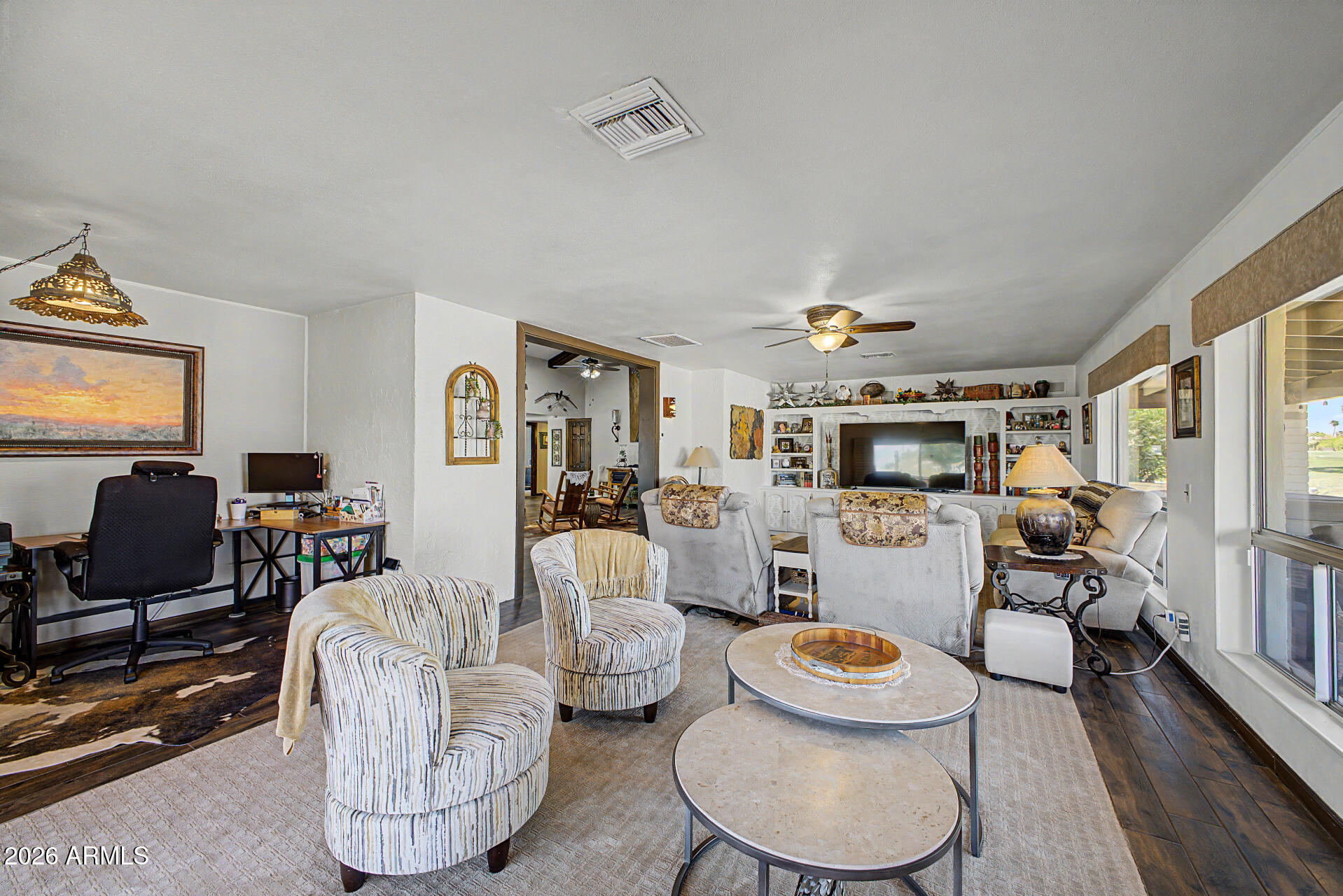 18722 East Rio Lane Rio Verde, AZ 85263 - Photo 11 of 55 a living room with furniture and a flat screen tv