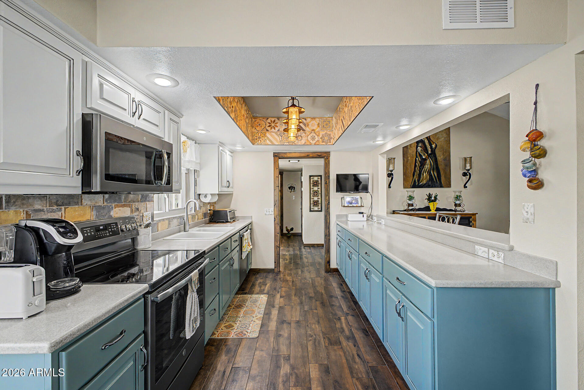 18722 East Rio Lane Rio Verde, AZ 85263 - Photo 13 of 55 a large kitchen with stainless steel appliances granite countertop a stove and a sink