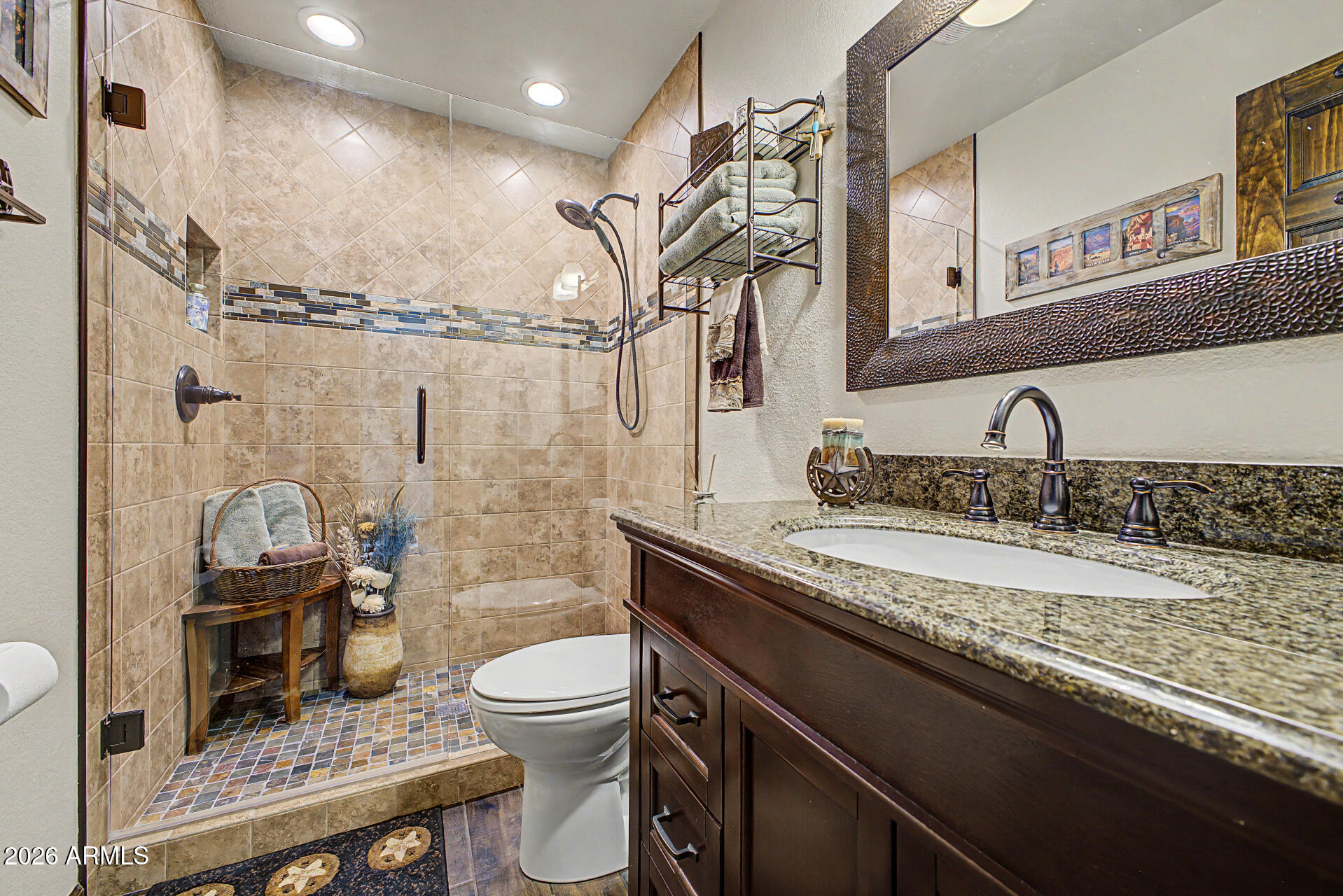 18722 East Rio Lane Rio Verde, AZ 85263 - Photo 23 of 55 a bathroom with a granite countertop sink a toilet and shower