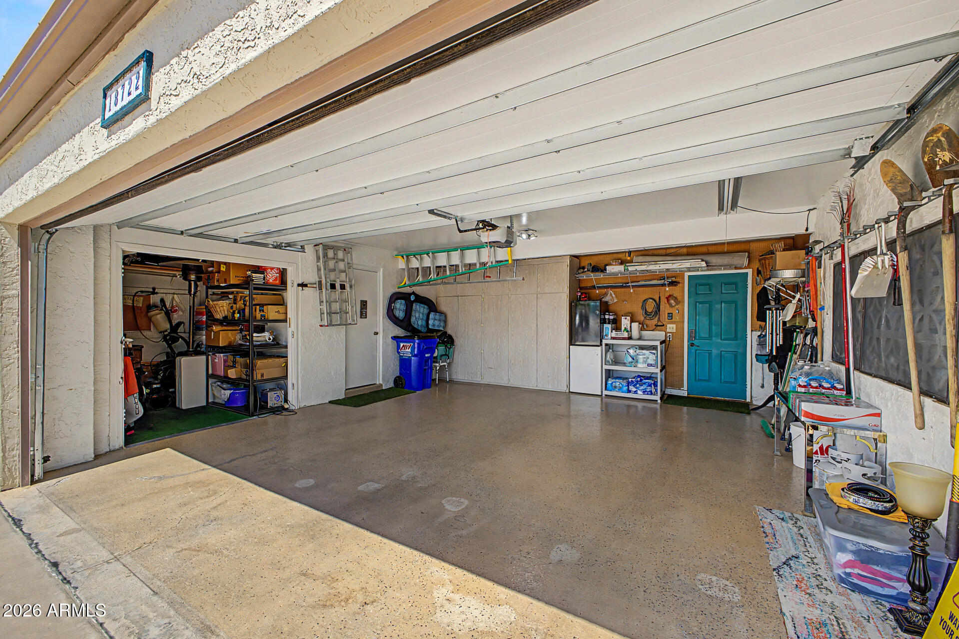 18722 East Rio Lane Rio Verde, AZ 85263 - Photo 26 of 55 a view of a garage with rack and bicycle