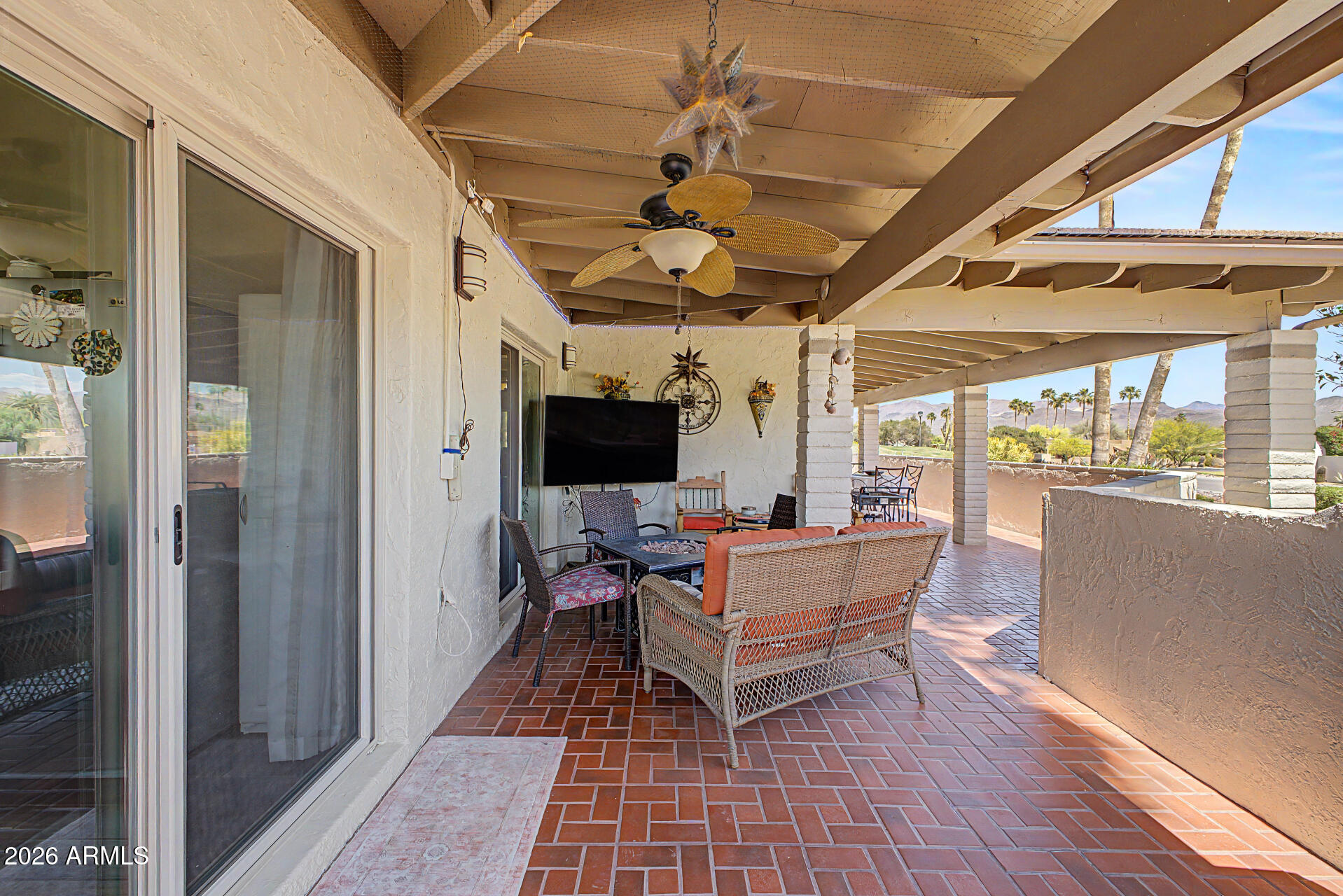 18722 East Rio Lane Rio Verde, AZ 85263 - Photo 30 of 55 a building outdoor space with patio furniture and a potted plant