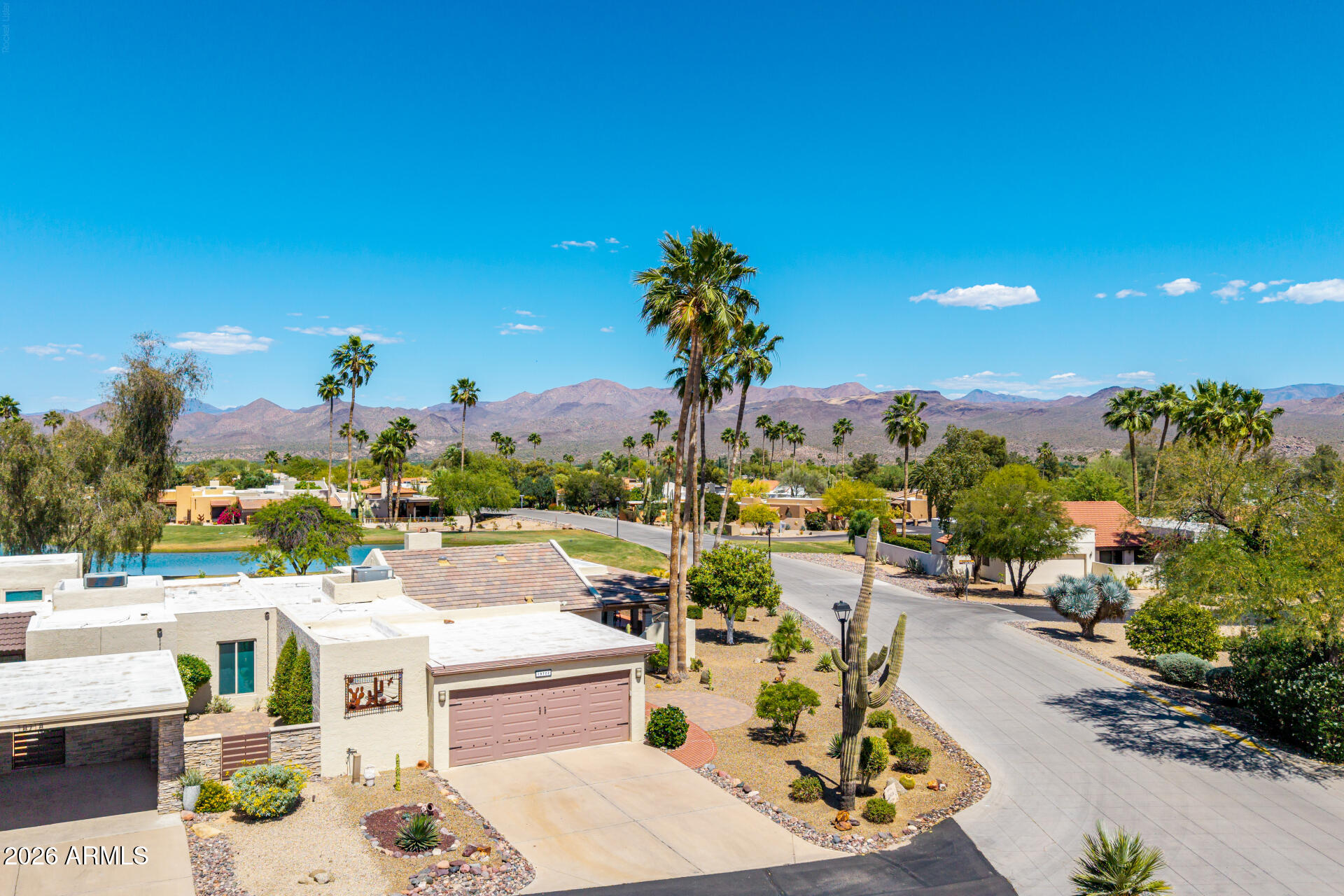 18722 East Rio Lane Rio Verde, AZ 85263 - Photo 33 of 55 a view of a patio with swimming pool